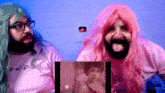 a man with a beard and pink hair is wearing a shirt that says ends