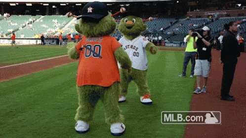 Astros mascot Orbit does battle with his evil twin, Norbit
