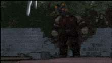 a blurred image of a cartoon character standing next to each other