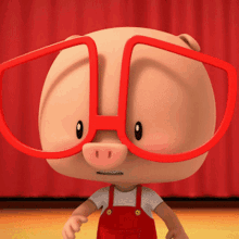 a pig wearing red glasses and red overalls