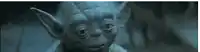 a close up of yoda 's face with his eyes closed .
