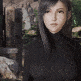 a woman in a black turtleneck sweater is looking at the camera