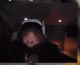 a screen shot of a man wearing a hat and goggles