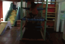 a blurred image of a child playing on a slide
