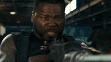 Firing A Gun Easy Day GIF - Firing A Gun Easy Day The Expendables 4 GIFs