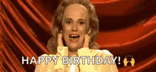 a woman is making a surprised face and saying `` happy birthday ! ''