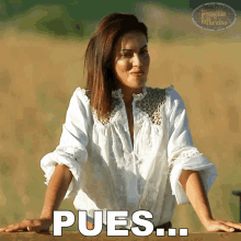 a woman leaning on a wooden fence with the word pues written on the bottom