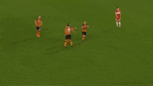 a soccer player with the number 7 on his jersey is running on the field