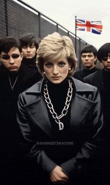 a woman wearing a necklace with the letter d on it stands in front of a group of men