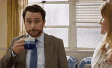 Drinking Coffee GIF - What Charlie Day Fist Fight GIFs