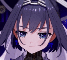 a close up of a girl 's face with purple hair and blue eyes .