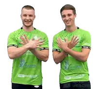 two young men wearing green shirts with haiduk written on them