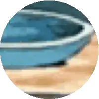 a blurry picture of a pool with a blue cover