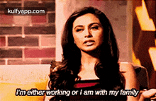 em either working or i am with my femily rani mukerji face person human
