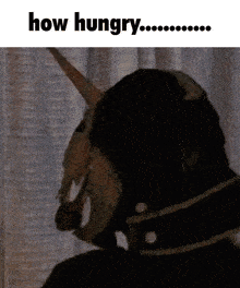 a person wearing a mask with horns and the words " how hungry " below them