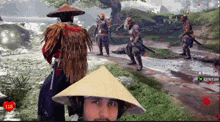 a man in a conical hat is playing a video game with 118 hearts