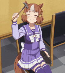 a girl in a purple school uniform is holding a hammer