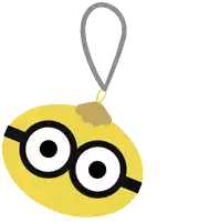 a yellow object with black circles on it is hanging from a rope