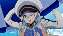 a girl with white hair and a blue shirt with the letter s on it