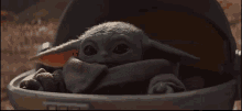 The Mandalorian Baby Yoda GIF - The Mandalorian Baby Yoda Cradle GIFs
