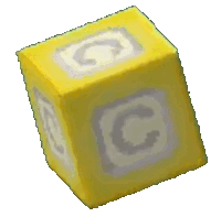 a yellow block with the letter c on it on a white background