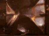a close up of a metal door with a reflection of light on it