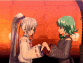 a couple of anime characters holding hands with one having green hair