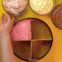 a person reaches for a bowl of whipped cream next to a bowl of ice cream