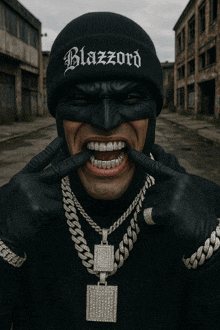 a man wearing a beanie that says blazzord on it