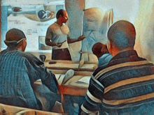 a man is giving a presentation to a group of people in a classroom