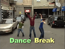 a group of young men are dancing in a street with the words dance break written above them