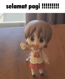 a cartoon doll with the words selamat pagi written on it