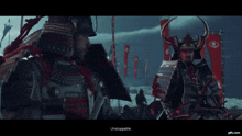 two samurai are standing next to each other with flags in the background and gifx.com is displayed at the bottom