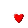 a red heart is floating in the air on a white background