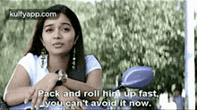 a woman is sitting on a motorcycle with a motorcycle mirror and a quote from a movie .