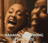 two women are laughing and one of them says ' hahaha you wrong for that '