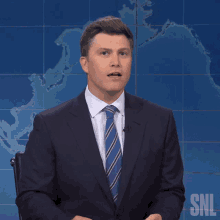 Reluctant Smile Colin Jost GIF - Reluctant Smile Colin Jost Saturday Night Live GIFs