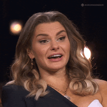 a close up of a woman 's face with the hashtag #cbcdragonsden on the bottom right
