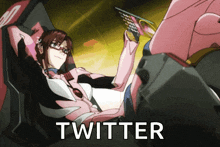 a woman in a pink suit is sitting in a chair with the word twitter written on the bottom