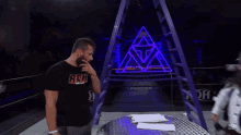 two men standing in front of a sign that says roh on it