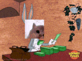 a cartoon of bugs bunny holding a stack of money