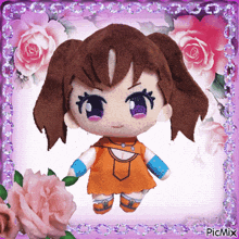 a picture of a stuffed doll with pink roses in the background and the words picmix at the bottom