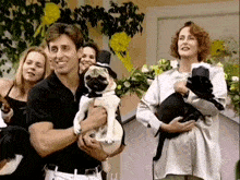 a man is holding a pug in a top hat
