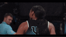 a blurred image of a person wearing a jersey with the number 17 on it