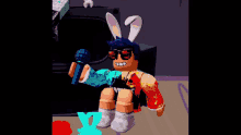 a boy with bunny ears is holding a microphone and making a peace sign