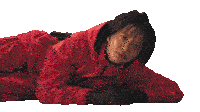 a woman in a red outfit is laying on the floor