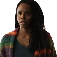 a woman with braids is wearing a plaid sweater and a green shirt