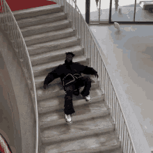 Lying On The Staircase Nigel Sylvester GIF