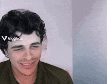 a man 's face is shown with the words viggle.ai above it