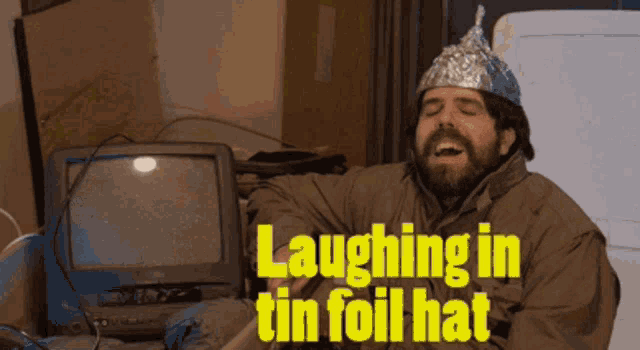 laughing-in-tin-foil-hat-tin-foil-hat.gi